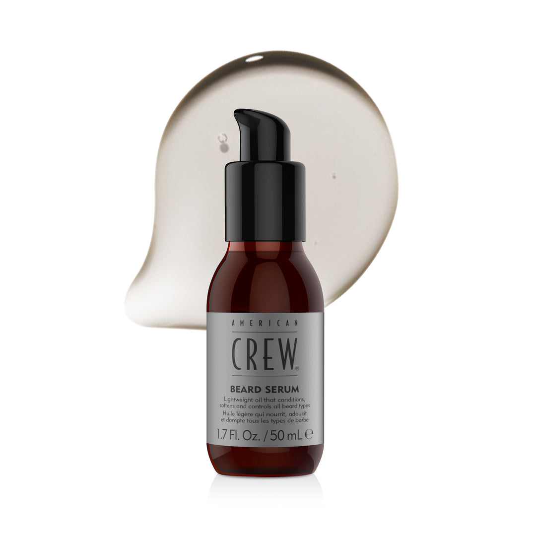 American Crew Beard Serum with clear gel droplets on a white background