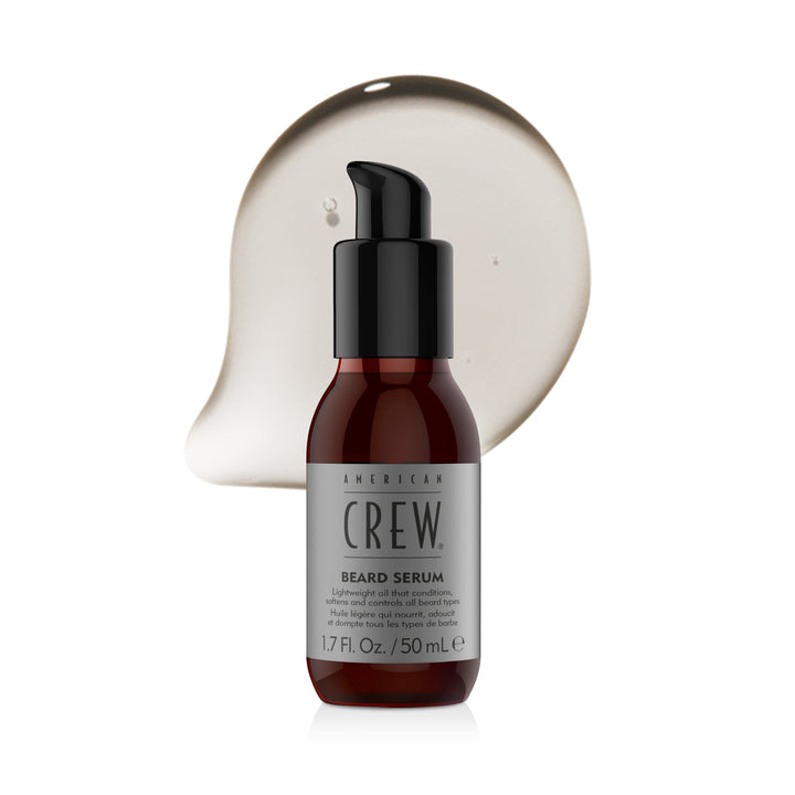 American Crew Beard Serum with clear gel droplets on a white background