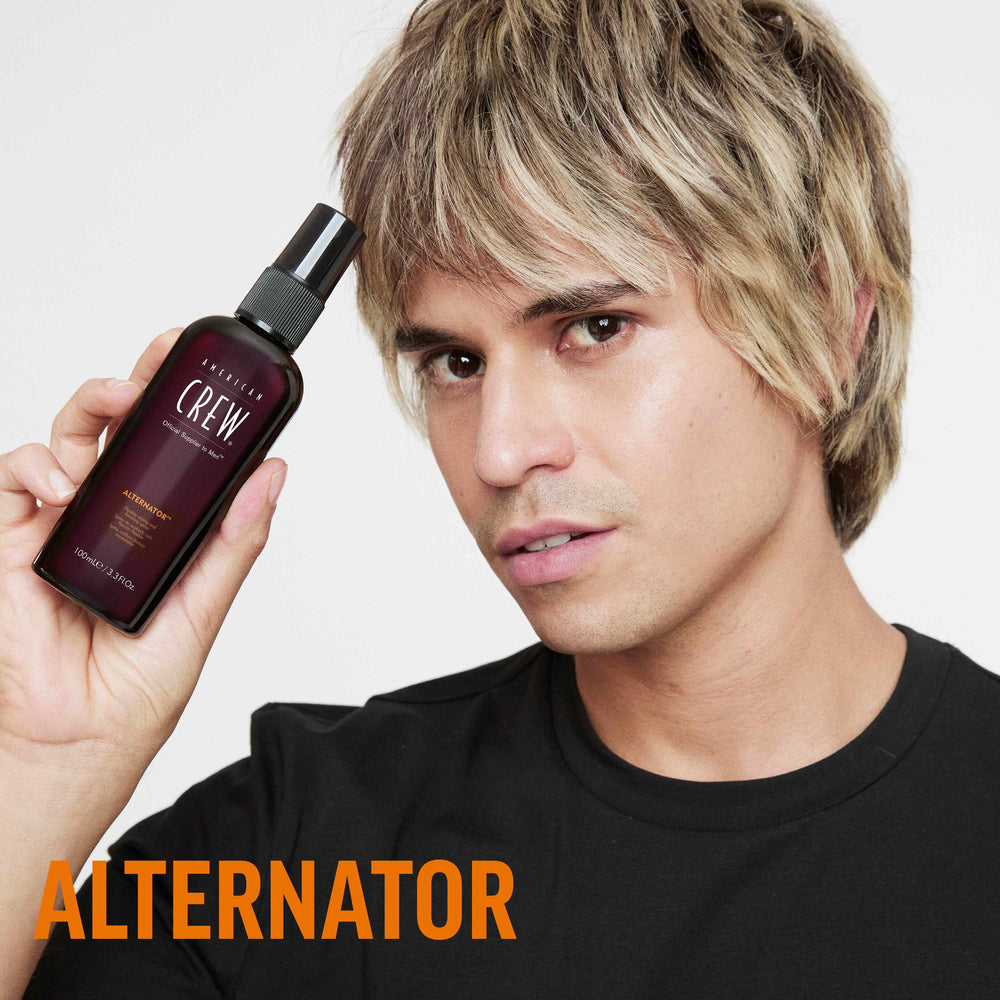 Finished Beauty Image. Junior Manuel Ferreria Caldera holding Alternator Finishing Spray by American Crew