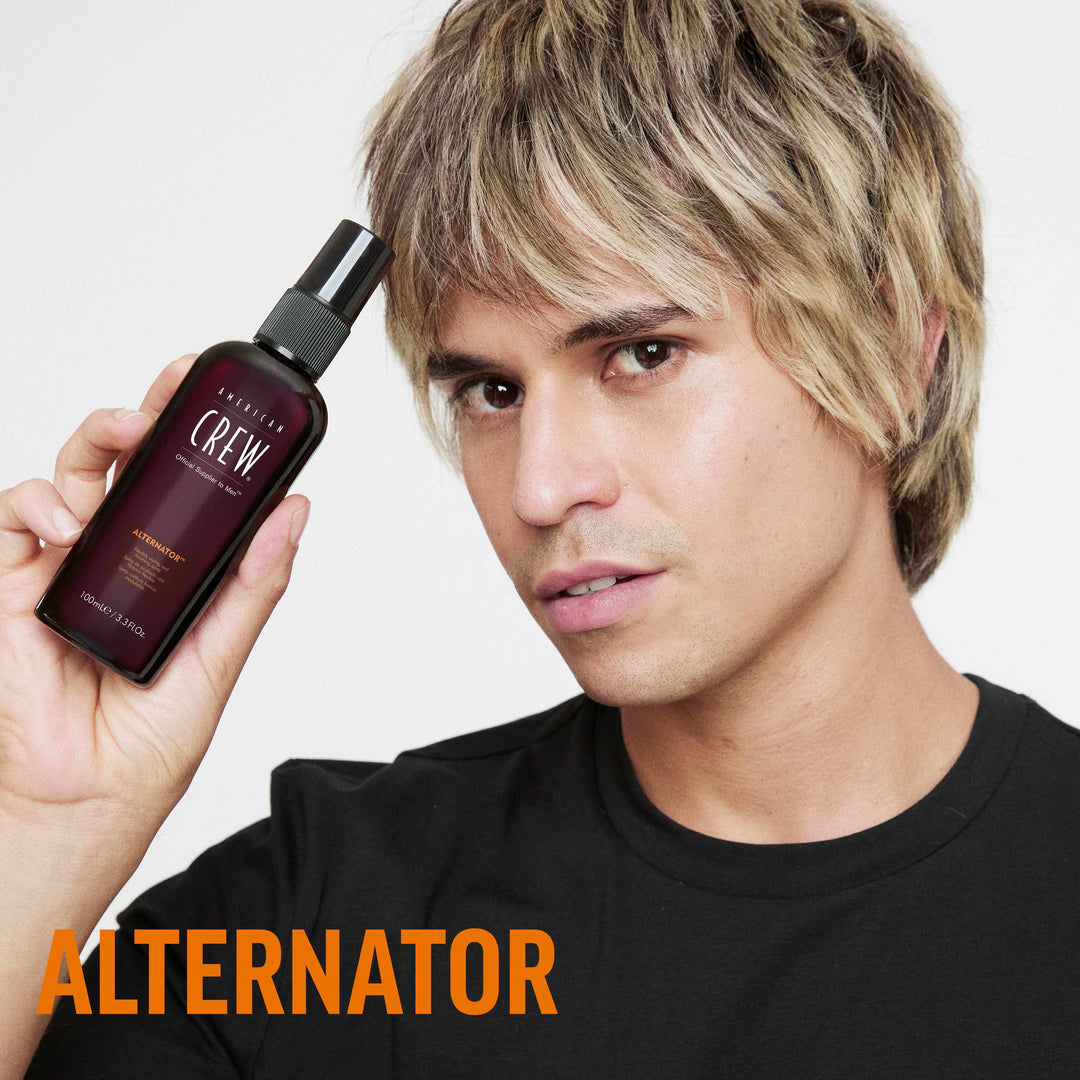 Finished Beauty Image. Junior Manuel Ferreria Caldera holding Alternator Finishing Spray by American Crew