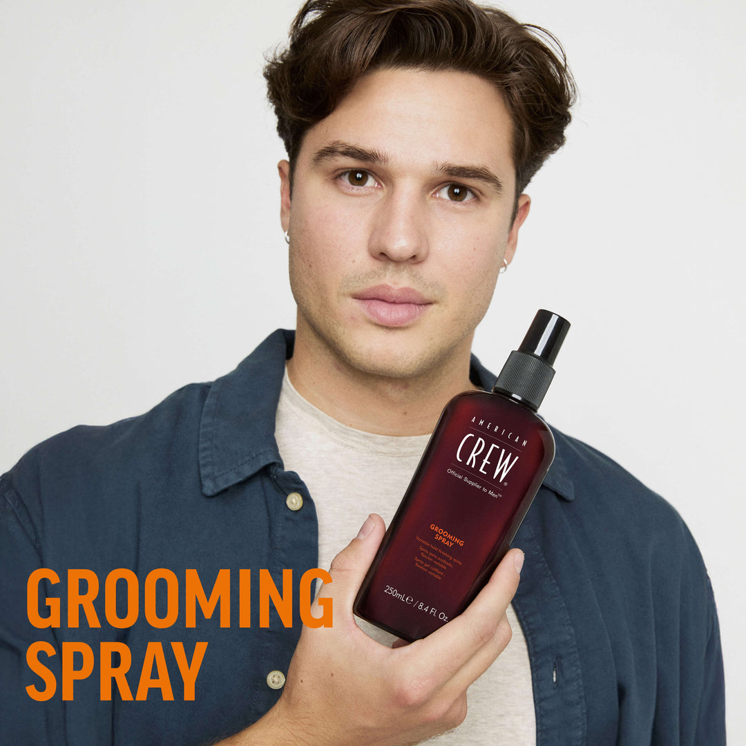 Finished Beauty Image. Dragan Mikulic Moragues holding Grooming Spray by American Crew