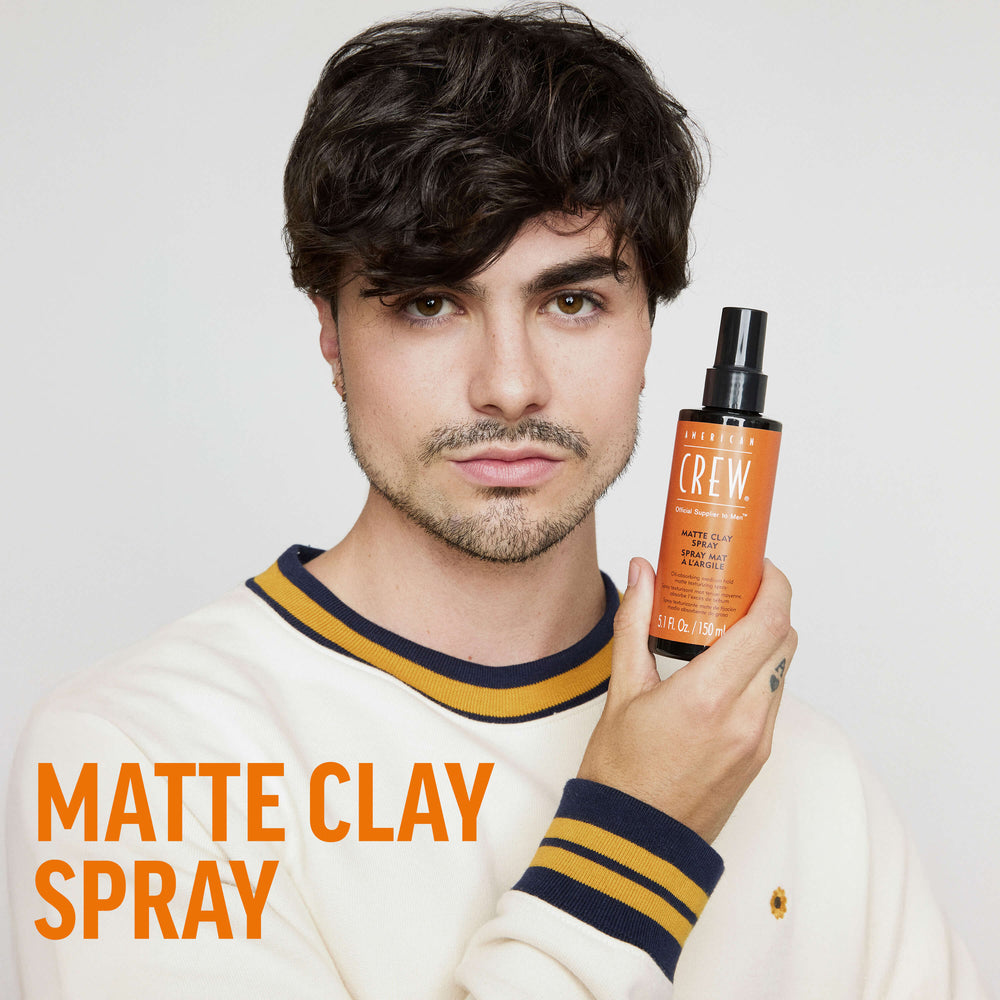 Finished Beauty Image. Alvaro Lopez Sainz Garcia holding Matte Clay Spray by American Crew