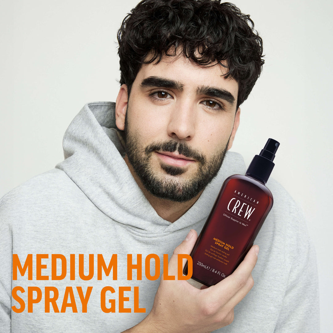Finished Beauty Image. Diego Serrano Rosado holding Medium Hold Spray Gel by American Crew