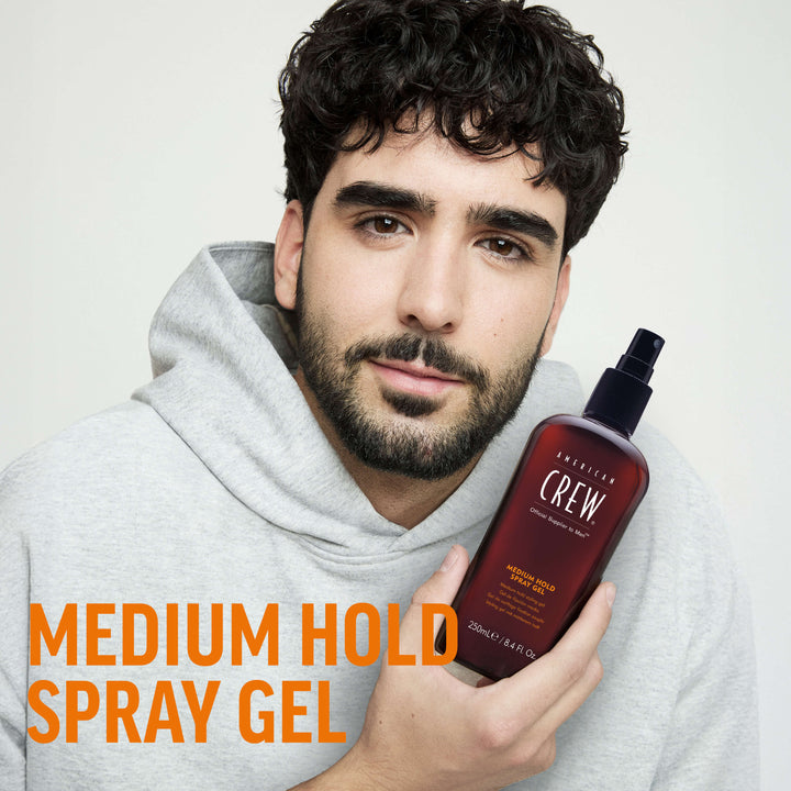 Finished Beauty Image. Diego Serrano Rosado holding Medium Hold Spray Gel by American Crew