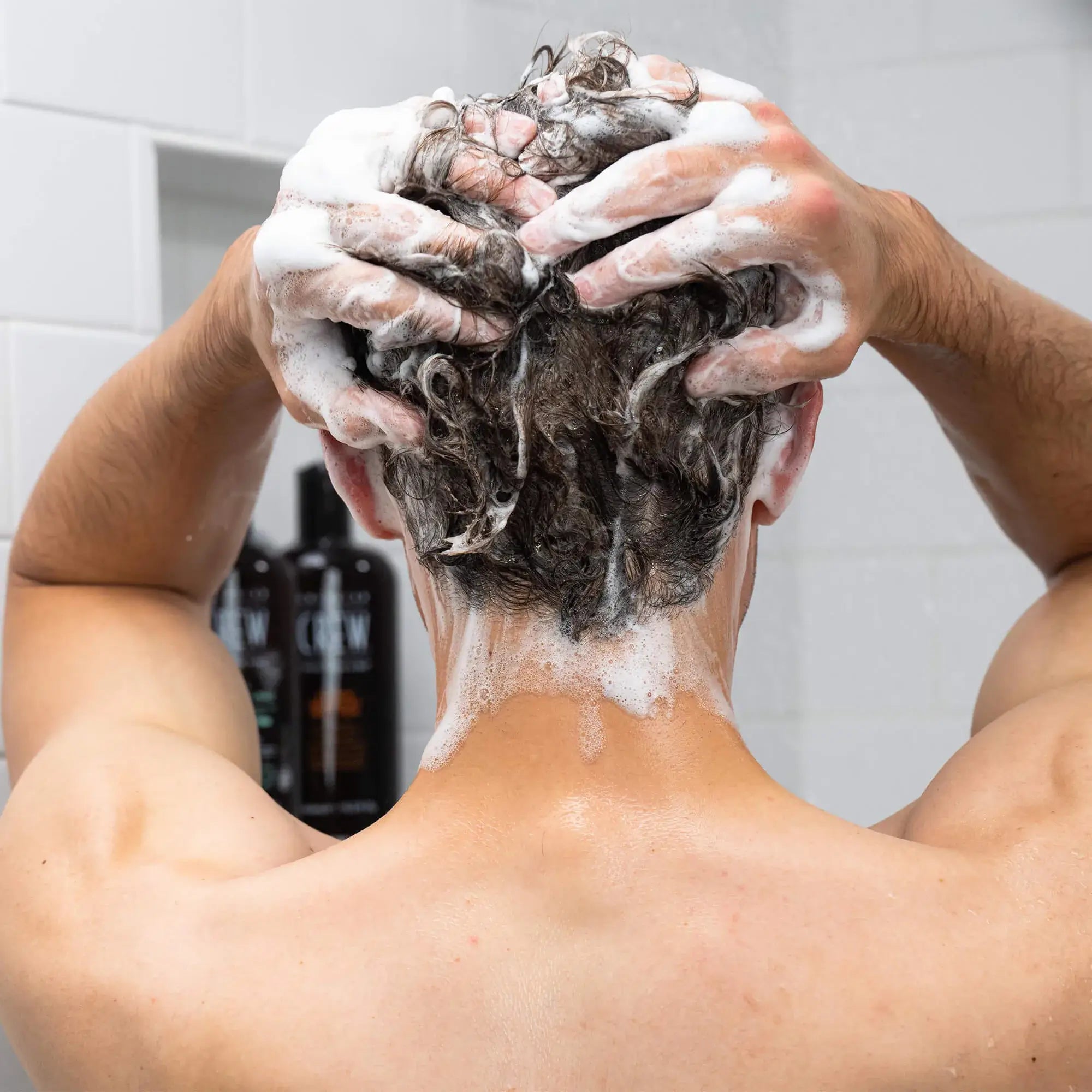 Model Wash Hair with American Crew Pre-Styling Cleanser Shampoo