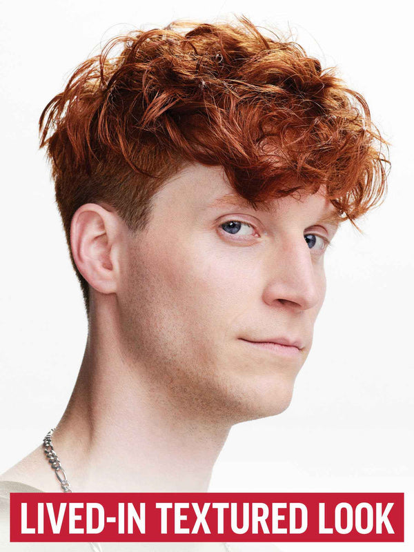 Cream Pomade Styling Puck on model showing lived-in textured look